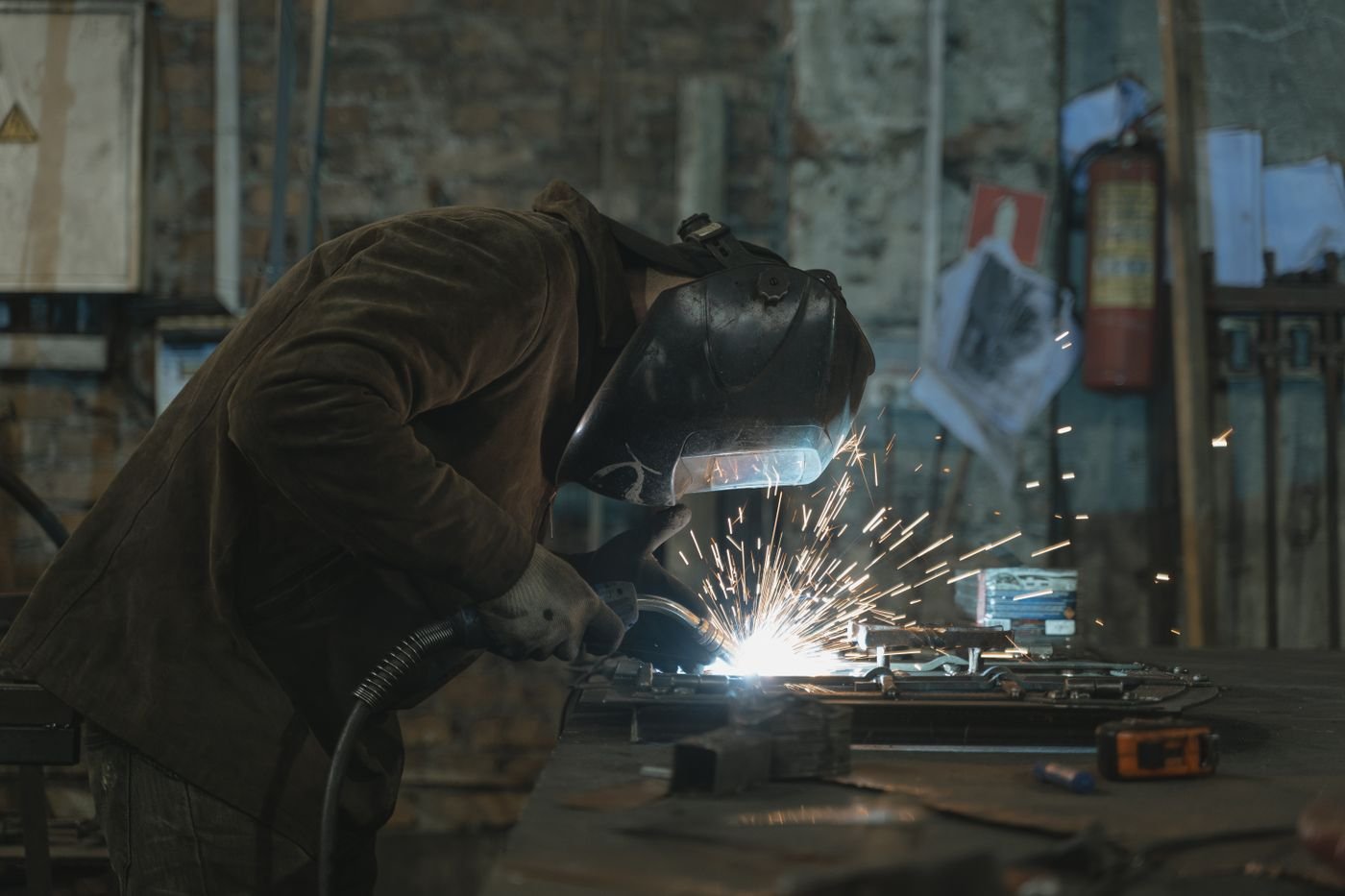Technician performing welding inspection work